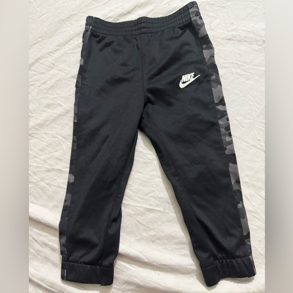 Black and grey Nike camo joggers